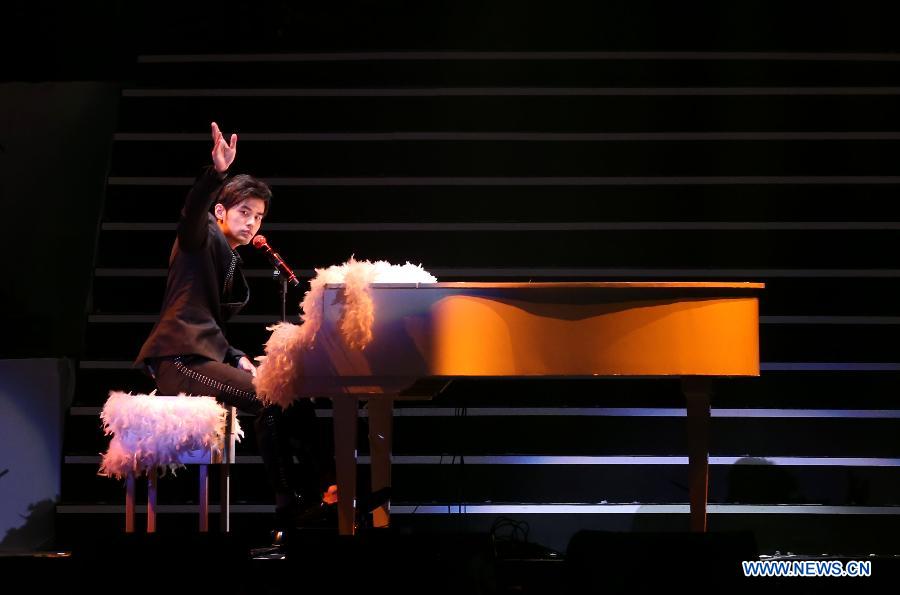 Singer Jay Chou performs during a memorial concert for Teresa Teng (1953-1995), one of the most famous pop singers in China, in the Taipei Arena in Taipei, southeast China's Taiwan, May 12, 2013. (Xinhua/Xie Xiudong) 