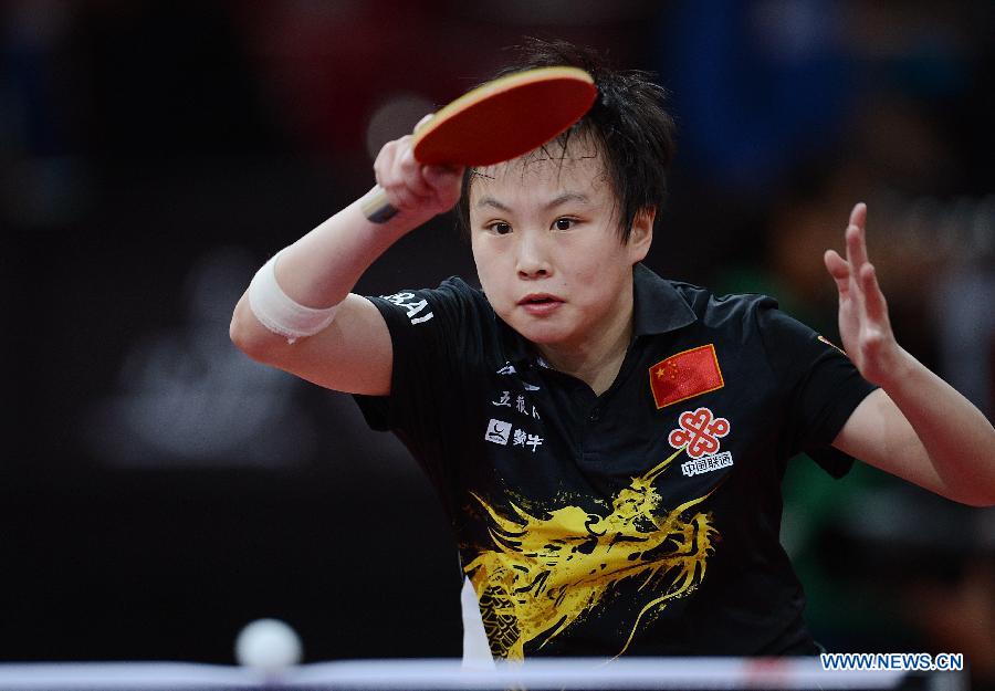 Hu Limei of China competes during the women's singles first round match against Georgina Pota of Hungary at the 2013 World Table Tennis Championships in Paris, France, May 15, 2013. Hu Limei won 4-0. (Xinhua/Tao Xiyi)