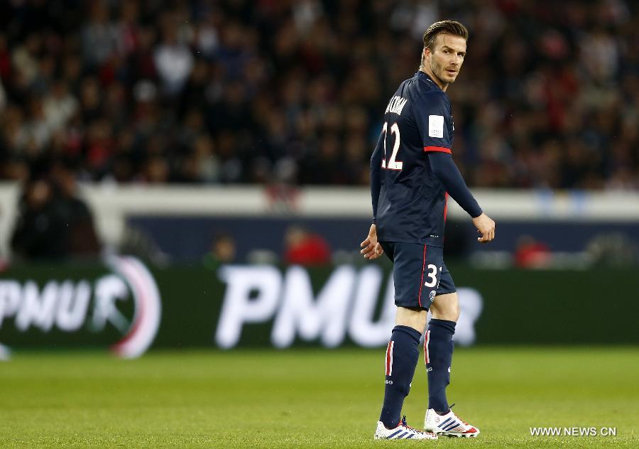 Paris Saint-Germain's English midfielder David Beckham looks on during the French League 1 football match between Paris St Germain and Brest at Parc des Princes stadium in Paris on May 18, 2013.(Xinhua/Wang Lili)