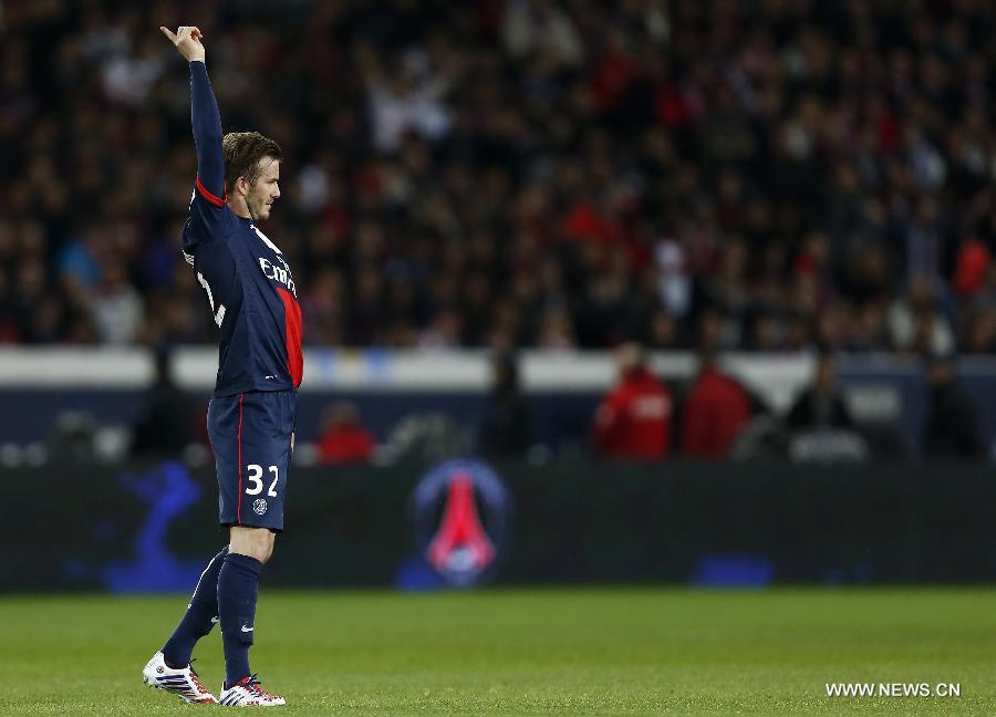 Paris Saint-Germain's English midfielder David Beckham reacts during the French League 1 football match between Paris St Germain and Brest at Parc des Princes stadium in Paris on May 18, 2013.(Xinhua/Wang Lili)