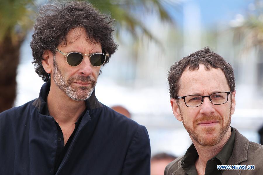Director Ethan Coen (R) and Joel Coen pose during a photocall for American film "Inside Llewyn Davis" presented in Competition at the 66th edition of the Cannes Film Festival in Cannes, on May 19, 2013. (Xinhua/Gao Jing)