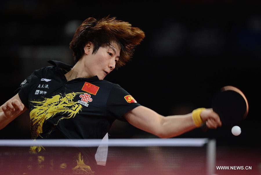 Ding Ning of China competes during semifinal of women's singles against her teammate Li Xiaoxia at the 2013 World Table Tennis Championships in Paris, France on May 18, 2013. Ding lost 2-4. (Xinhua/Tao Xiyi)