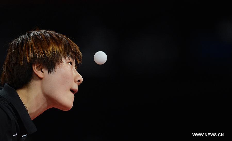 Ding Ning of China competes during semifinal of women's singles against her teammate Li Xiaoxia at the 2013 World Table Tennis Championships in Paris, France on May 18, 2013. Ding lost 2-4. (Xinhua/Tao Xiyi)