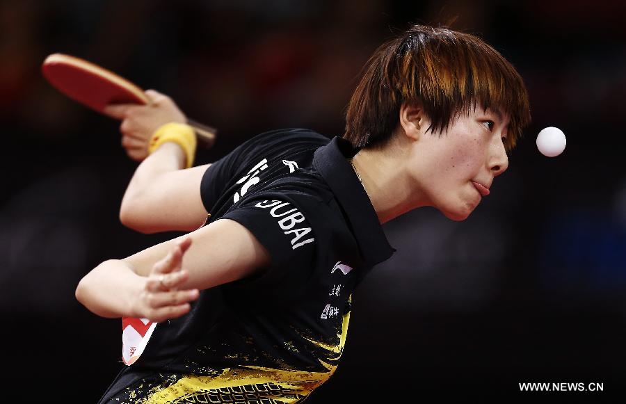 Ding Ning of China competes during semifinal of women's singles against her teammate Li Xiaoxia at the 2013 World Table Tennis Championships in Paris, France on May 18, 2013. Ding lost 2-4. (Xinhua/Wang Lili)
