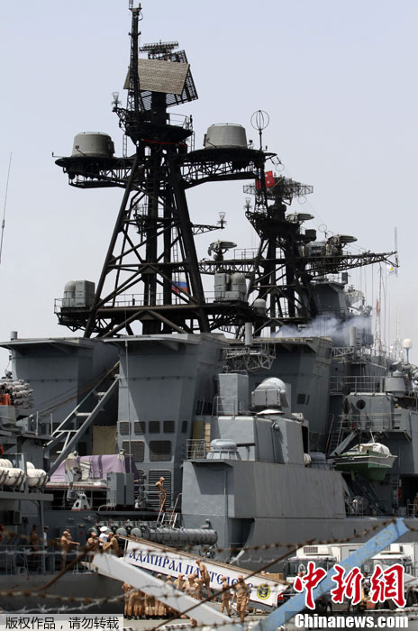 Russian sailors are seen aboad the Admiral Panteleyev Russian war ship moored at the Cypriot port of Limassol on Friday, May 17, 2013. (Photo Source: chinanews.com)