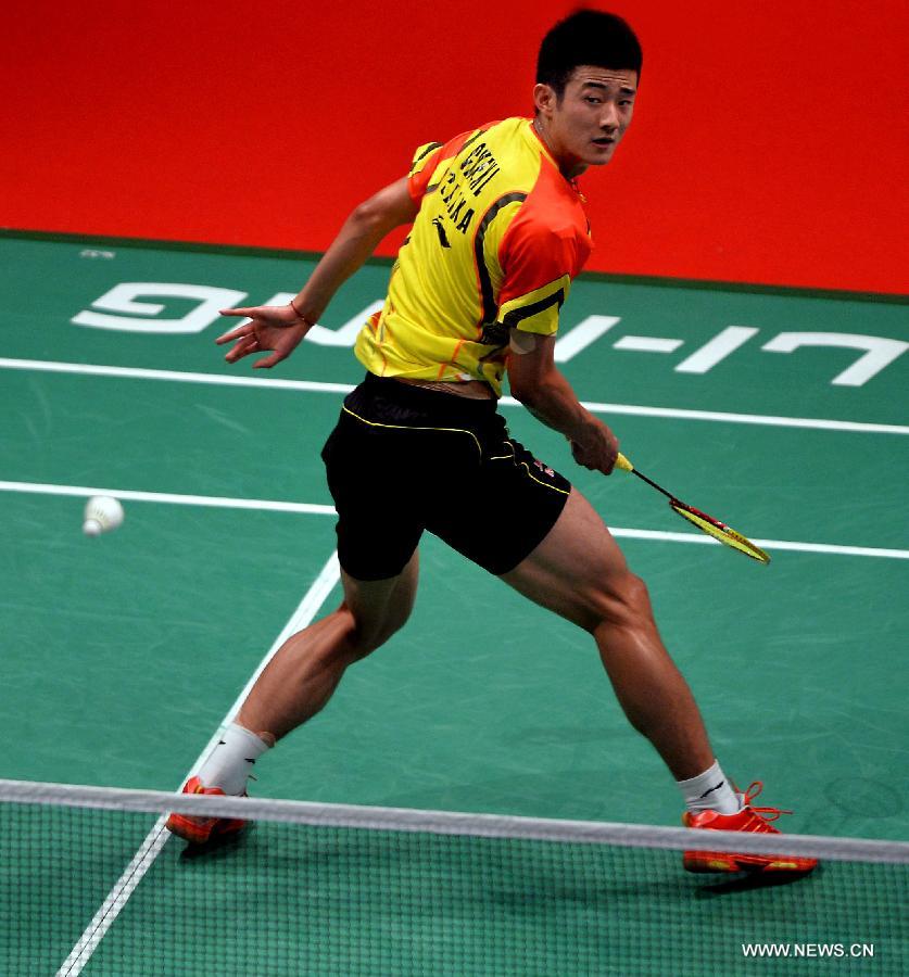 Chen Long of China returns a shot during the 2013 Sudirman Cup world mixed team badminton championship match against India's Parupalli Kashyap in Kuala Lumpur, Malaysia, on May 19, 2013. Chen won 2-0. (Xinhua/Chen Xiaowei)