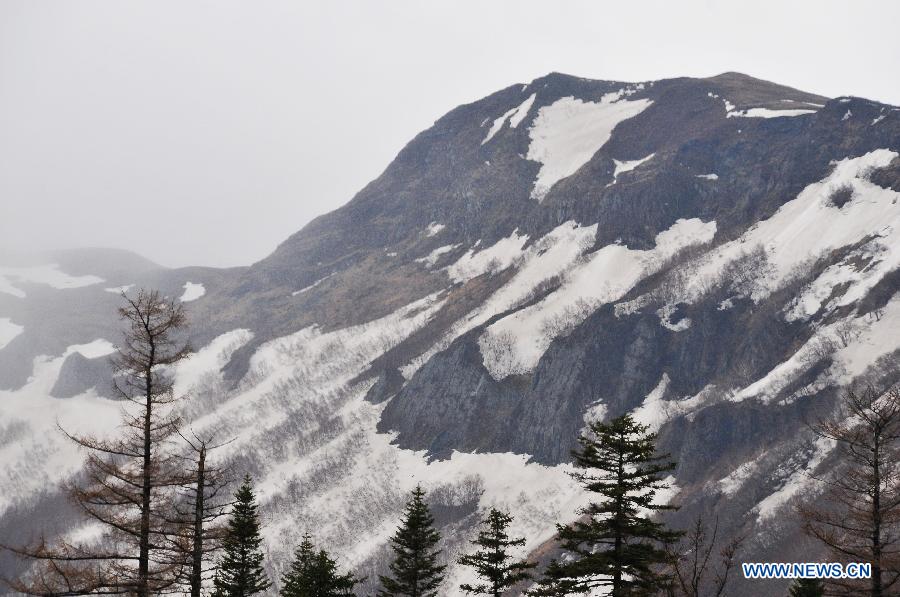 Snow is seen at the Changbai Mountain in northeast China's Jilin Province, May 19, 2013. (Xinhua/Zhang Jian)