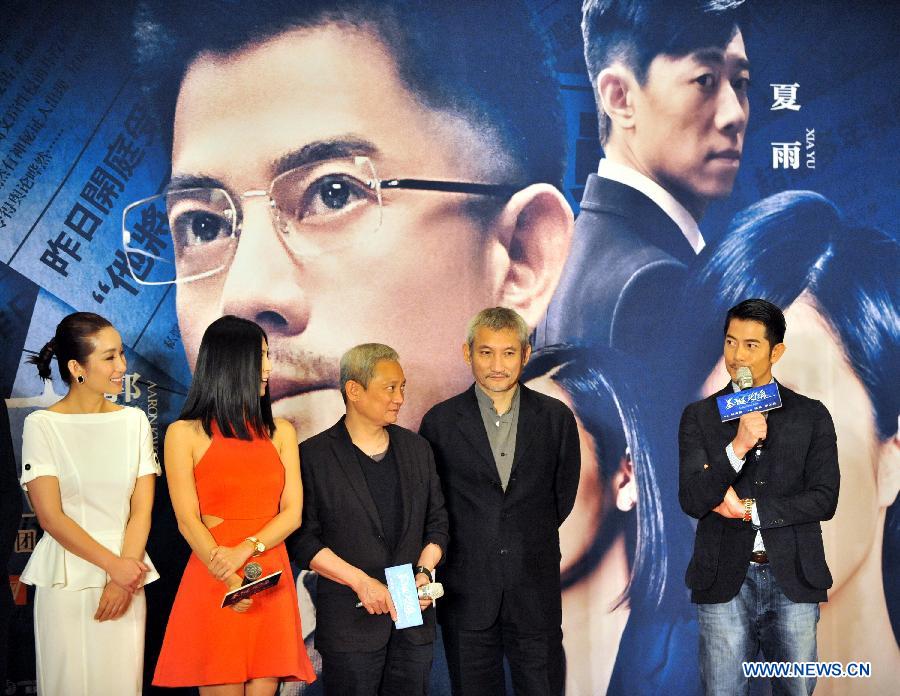 Actor Aaron Kwok (1st R) gives a biref introduction on the movie Christmas Rose at a press conference held for the movie's premiere in Beijing, China, May 20, 2013. The movie is expected to be released in China on May 24, 2013. (Xinhua/Bi Xiaoyang)