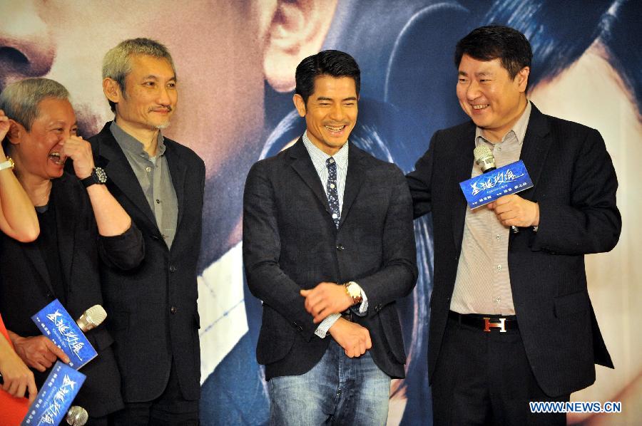 Actor Aaron Kwok (2nd R) and executive producer Tsui Hark (2nd L) attend a press conference held for the premiere of movie Christmas Rose in Beijing, China, May 20, 2013. The movie is expected to be released in China on May 24, 2013. (Xinhua/Bi Xiaoyang)