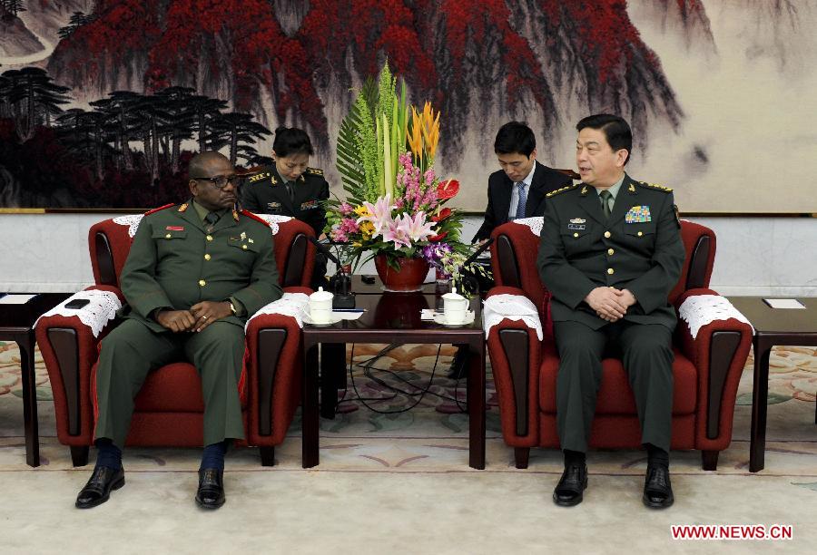 Chinese State Councilor and Defense Minister Chang Wanquan (R) meets with Paulino Macaringue, chief of the General Staff of the Armed Forces for the Defense of Mozambique, in Beijing, capital of China, May 20, 2013. (Xinhua/Zhang Duo)
