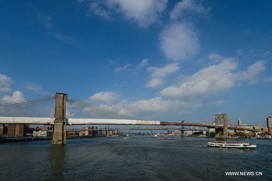 The Brooklyn Bridge is seen in New York, the United States, on May 20, 2013. The Brooklyn Bridge, opened on May 24, 1883, will celebrate its 130th birthday this week. (Xinhua/Niu Xiaolei)