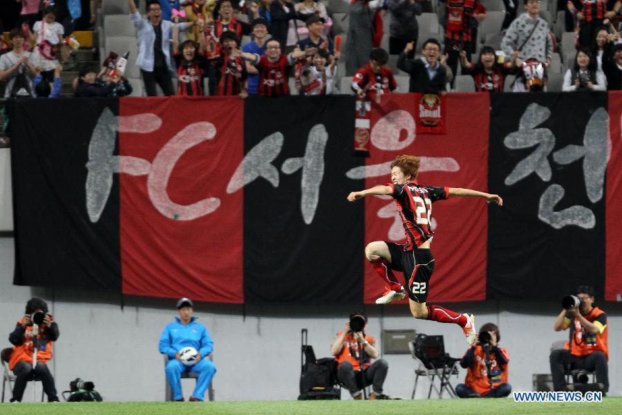  Koh Myung-jin (C) of South Korea's FC Seoul celebrate after scoring a goal against China's Beijing Guoan during their AFC Champions League eighth-final match at the Seoul World Cup Stadium, in Seoul, South Korea, May 21, 2013. FC Seoul won 3-1. (Xinhua/Park Jin Hee) 