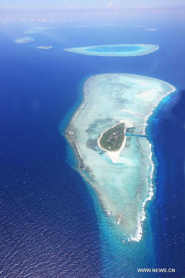 Photo taken on May 20, 2013 shows the scenery of Coral Island of Yongle Islands in Sansha City, south China's Hainan Province. (Xinhua/Zha Chunming)