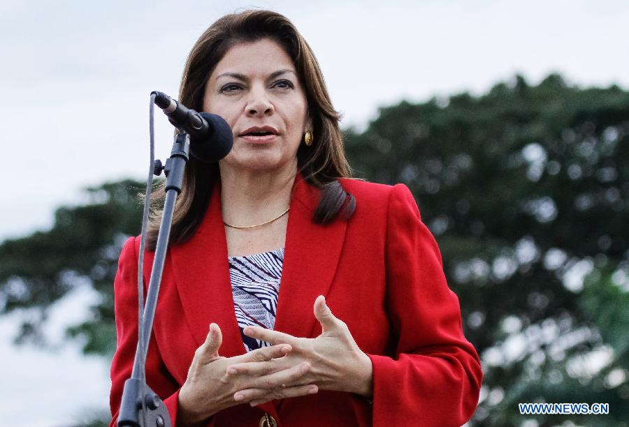 Costa Rica's President Laura Chinchilla delivers a speech upon her arrival at the Alfonso Bonilla Aragon Inernational Airport in the city of Cali, Colombia, on May 22, 2013. Laura Chinchilla arrived in Cali to attend the VII Pacific Alliance Summit. (Xinhua/Jhon Paz) 
