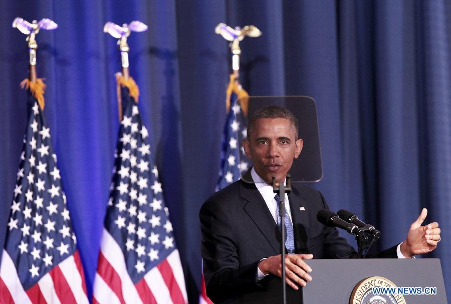 U.S. President Barack Obama deliveries a speech at the National Defence University in Washington D.C. on May 23, 2013. Obama on Thursday sought to redefine his administration's counterterrorism policies, announcing new guidelines codifying controversial drone strikes against militant targets, while renewing his pledge to close the Guantanamo Bay military detention facility. (Xinhua/Fang Zhe)