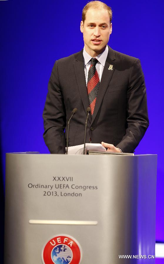 Prince William, the Duke of Cambridge, addresses the XXXVII Ordinary UEFA Congress 2013 at Grovesnor House Hotel in London, Britain, on May 24, 2013. (Xinhua/Wang Lili) 