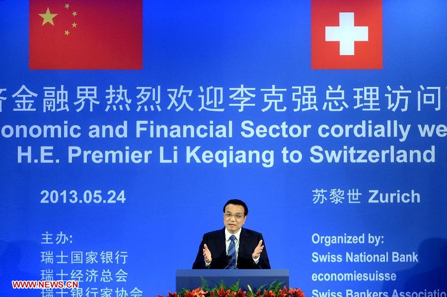 Chinese Premier Li Keqiang gives a speech at a luncheon with business and financial leaders in Zurich, Switzerland, May 24, 2013. (Xinhua/Li Tao)