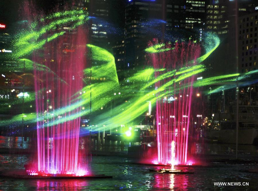The Darling Harbour is lit up during the Vivid Sydney, a festival of light, music and ideas, in Sydney, Australia, May 24, 2013. (Xinhua/Jin Linpeng)