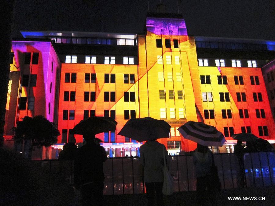 The Museum of Contemporary Art Australia is lit up during the Vivid Sydney, a festival of light, music and ideas, in Sydney, Australia, May 24, 2013. (Xinhua/Jin Linpeng)