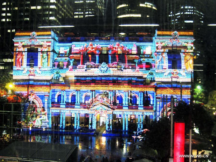 The former Custom House is lit up during the Vivid Sydney, a festival of light, music and ideas, in Sydney, Australia, May 24, 2013. (Xinhua/Jin Linpeng)