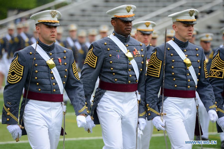 Graduating cadets attend the graduation ceremonies at the United States Military Academy at West Point, New York, the United States, May 25, 2013. 1,007 cadets graduated on Saturday from the famous military academy founded in 1802. (Xinhua/Wang Lei)
