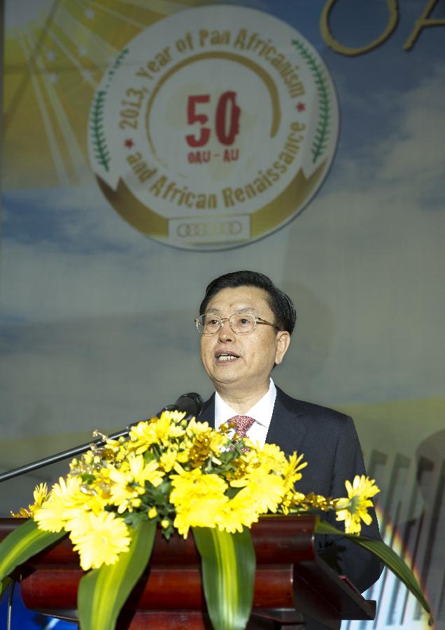 Zhang Dejiang, chairman of the Standing Committee of the National People's Congress, addresses the reception held by the African Diplomatic Corps in China to mark the 50th founding anniversary of the Organization of African Unity (OAU), predecessor of the African Union (AU), in Beijing, capital of China, May 25, 2013. (Xinhua/Xie Huanchi)