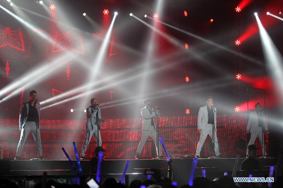 American vocal group Backstreet Boys perform during their 2013 world tour concert at the MasterCard Center in Beijing, capital of China, May 25, 2013. This year marks the 20th anniversary of the founding of the group. (Xinhua/Yang Le)