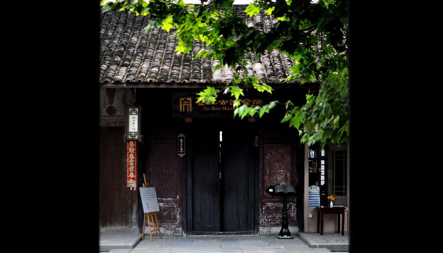 A compound built in the Republic of China (1911-1949) is seen in Anren, an ancient town in Dayi County of Chengdu, capital of southwest China's Sichuan Province, May 23, 2013. Anren Town was first built in ancient China's Tang Dynasty (618-907). Most of its buildings were constructed in late Qing Dynasty (1644-1911) and early Republic of China. Chengdu will host the Global Fortune Forum, an event to be organized by the American magazine "Fortune", on June 6-8. (Xinhua/Shen Hong) 