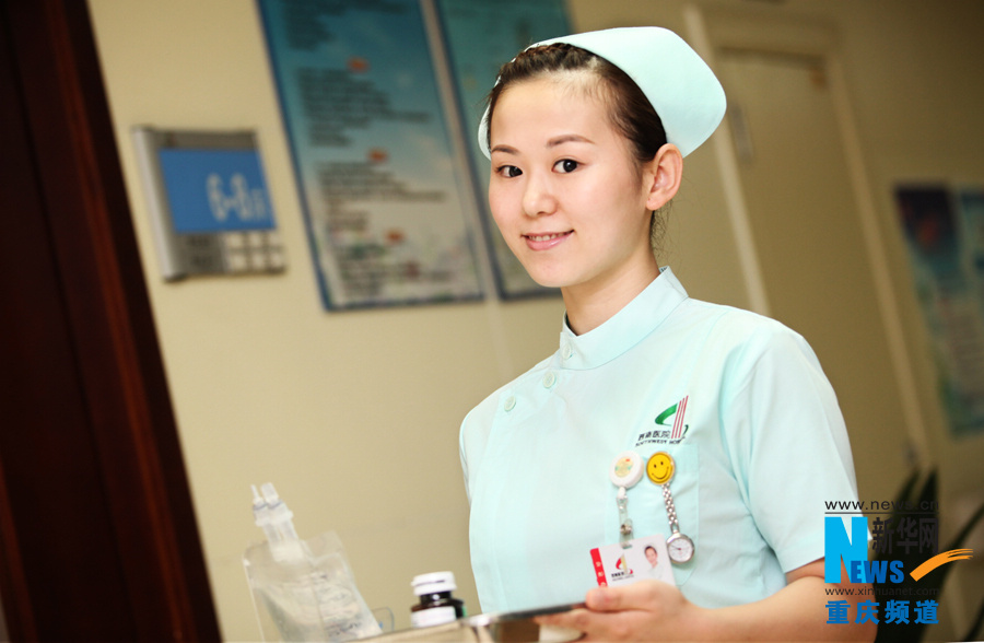 Wang Lingling, born in 1989, is a nurse in Chongqiing South West Hospital. She enjoys swimming after work. (Xinhua/Peng Bo)