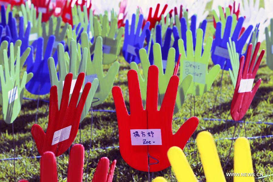 Photo taken on May 27, 2013, shows the large art work of "The Sea of Hands" during the Reconciliation Week 2013 in the University of Sydney, Australia. The first "Sea of Hands" was held on Oct. 12, 1997, in Australia's capital of Canberra. (Xinhua/Jin Linpeng) 
