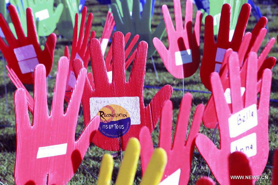 Photo taken on May 27, 2013, shows the large art work of "The Sea of Hands" during the Reconciliation Week 2013 in the University of Sydney, Australia. The first "Sea of Hands" was held on Oct. 12, 1997, in Australia's capital of Canberra. (Xinhua/Jin Linpeng) 