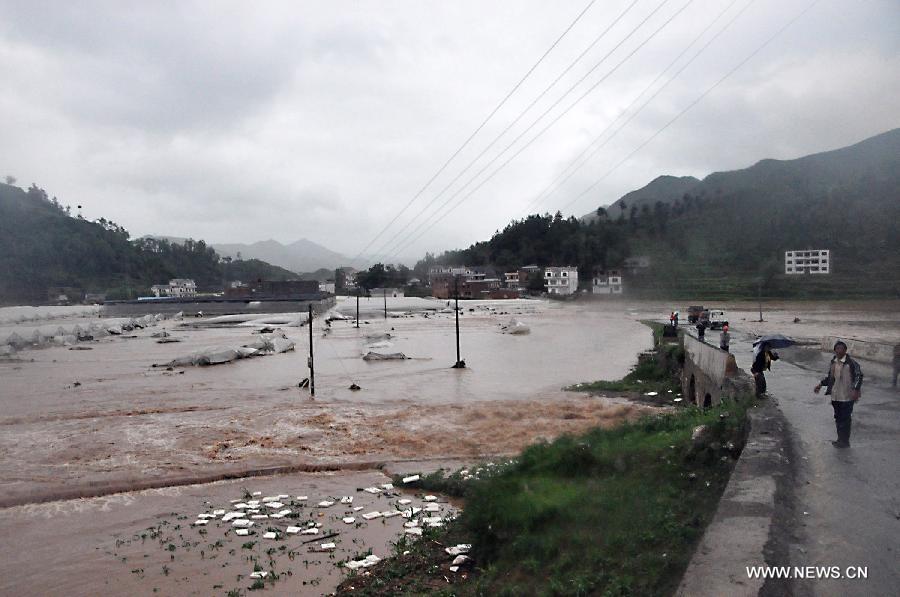 Farmlands are flooded in Changba Village of Bijie City, southwest China's Guizhou Province, May 29, 2013. Heavy rainfall hit the city from Tuesday to Wednesday. (Xinhua/Deng Jie)