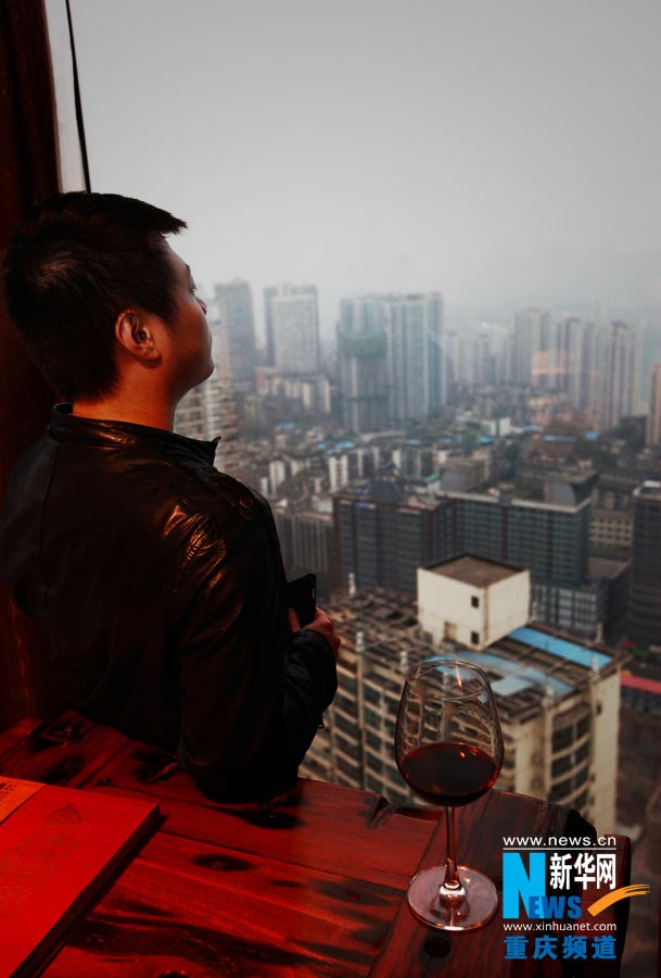 The wine club does have its moment while you enjoy a glass of wine and look at the city's view. (Photo/ Xinhua)