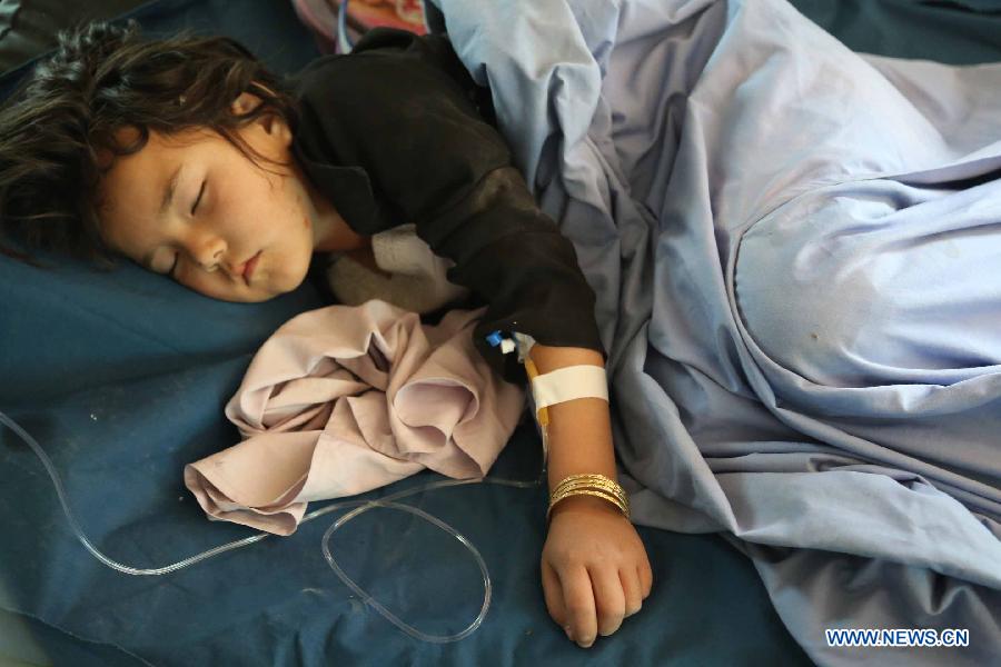 An wounded girl receives treatment at a hospital in Ghazni city, Afghanistan, on May 29, 2013. Earlier on Wednesday, four people, including three school girls, were wounded when two back-to-back Improvised Explosive Devices ( IEDs) went off near a girl school in Ghazni city, the provincial capital of eastern Ghazni province 120 km south of capital Kabul. (Xinhua/Rahmat) 