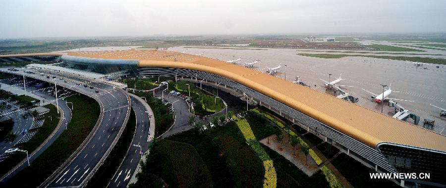 Photo taken on May 30, 2013 shows a general view of the Hefei Xinqiao International Airport in east China's Anhui Province. Located in Gaoliu Town of Feixi County, 31.8 kilometers away from the center of Hefei City, Xinqiao International Airport has replaced Luogang International Airport as Hefei's main airport. (Xinhua/Ma Qibing)