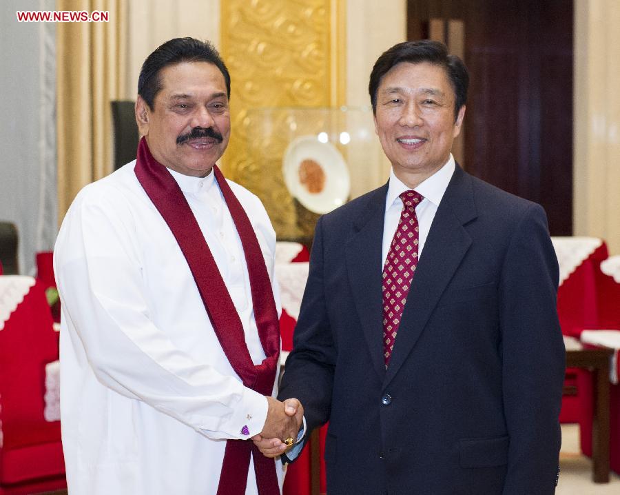 Chinese Vice President Li Yuanchao (R) meets with President of Sri Lanka Mahinda Rajapaksa in Xi'an, capital of northwest China's Shaanxi Province, May 30, 2013. (Xinhua/Wang Ye) 