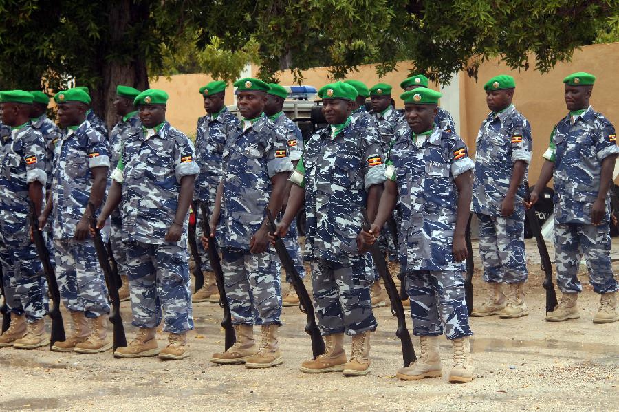 Police Units of the African Union Mission in Somalia (AMISOM) stand in position after concluding training in the Somali capital Mogadishu Thursday May 30, 2013. The AMISOM police force, part of the nearly-20,000-member AU peacekeeping mission, are expected to be deployed along with local police. (Xinhua/Faisal Isse)