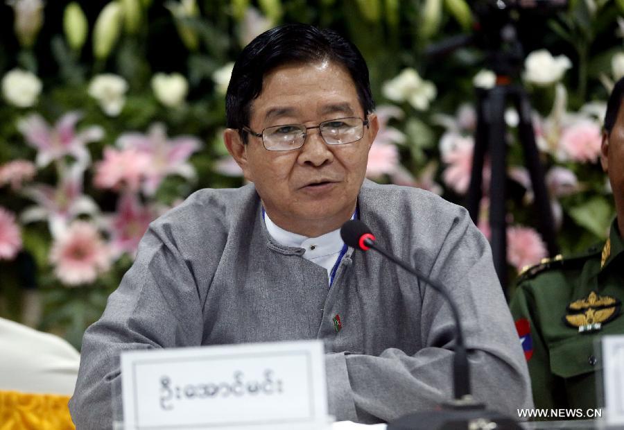 U Aung Min, vice chairman of the Central Peace Making Work Committee and minister at the President's Office, attends a press conference in Myitgyina, Myanmar, May 30, 2013. Myanmar government and the Kachin Independence Organization (KIO) signed a seven-point peace talk agreement on the final day of their three-day talk in Myitgyina, capital of north Myanmar's Kachin state on Thursday. (Xinhua/U Aung)
