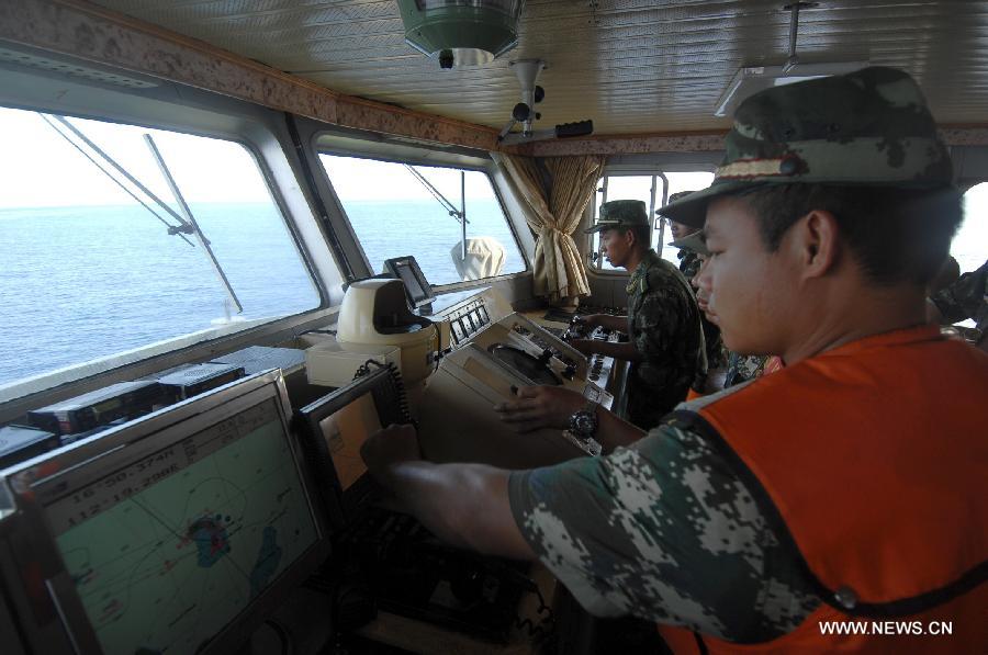 China Coast Guard vessel 46001 leaves the port of the Yongxing Island of Sansha City, south China's Hainan Province, May 31, 2013. The vessel accomplished a 10-hour patrol of the sea areas around Yongle Islands on Friday. (Xinhua/Wei Hua)