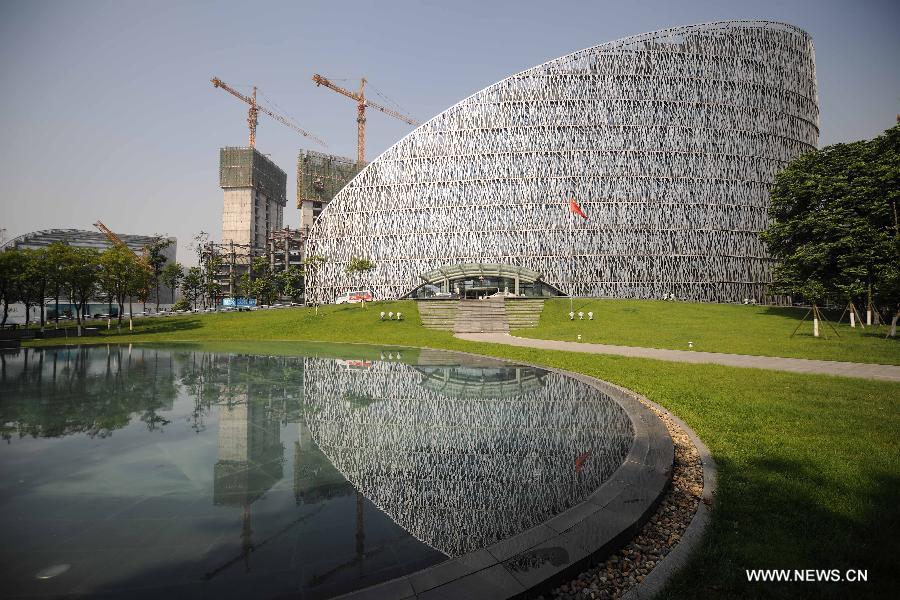 Photo taken on May 21, 2013 shows a scene of Tianfu International Financial Center in Chengdu, capital of southwest China's Sichuan Province. By the end of 2012, Chengdu's GDP has reached 800 billion RMB (about 130.48 billion U.S. dollars), ranking the 3rd place in China's sub-provincial cities. By May of 2013, more than 230 enterprises in the Fortune 500 have come to Chengdu. The 2013 Fortune Global Forum will be held in Chengdu from June 6 to June 8. Chengdu, an ancient city with a history of over 2,300 year, is developing into an international metropolis with its huge economic development potential as well as its special cultural environment. (Xinhua/Shen Hong)