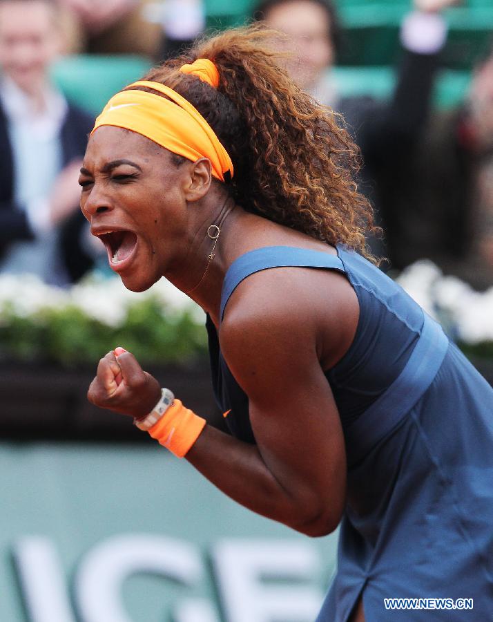 Serena Williams of the United States celebrates during the women's singles third round match against Sorana Cirstea of Romania at the French Open tennis tournament at the Roland Garros stadium in Paris May 31, 2013. Serena Williams won 2-0. (Xinhua/Gao Jing) 
