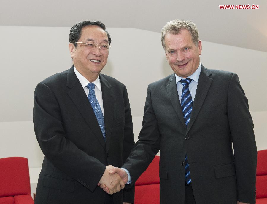 Yu Zhengsheng (L), chairman of the National Committee of the Chinese People's Political Consultative Conference, meets with Finnish President Sauli Niinisto in Helsinki, capital of Finland, May 31, 2013. Yu Zhengsheng paid an official goodwill visit to Finland from May 30 to June 1. (Xinhua/Li Xueren)  
