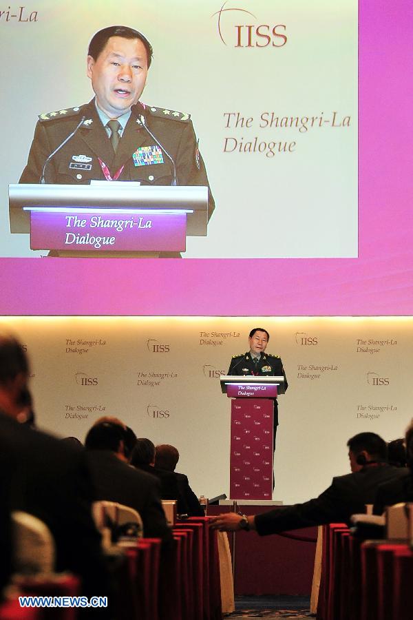Qi Jianguo, deputy chief of the General Staff of the Chinese People's Liberation Army, delivers a speech during the Shangri-La Dialogue in Singapore, June 2, 2013. The 12th Shangri-La Dialogue kicked off in Singapore on May 31. (Xinhua/Then Chih Wey)