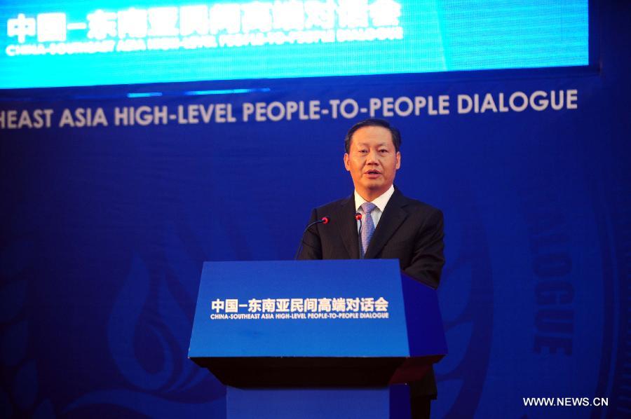 Peng Qinghua, secretary of Guangxi Zhuang Autonomous Regional Committee of the Communist Party of China, addresses the opening ceremony of the China-Southeast Asia High-Level People-To-People Dialogue in Nanning, capital of south China's Guangxi Zhuang Autonomous Region, June 3, 2013. (Xinhua/Huang Xiaobang)