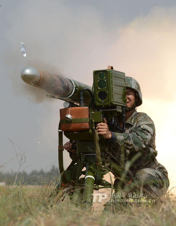 A cadet who will graduate from Langfang Barrack of Nanjing Artillery Academy of the Chinese People's Liberation Army (PLA) in a comprehensive live-ammunition tactical exercises in harsh conditions and complex environment. (China Military Online/Liu Fengan) 