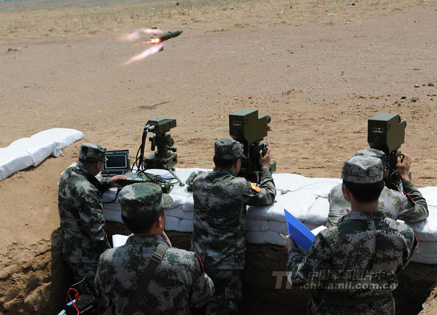 Cadets who will graduate from Langfang Barrack of Nanjing Artillery Academy of the Chinese People's Liberation Army (PLA) in a comprehensive live-ammunition tactical exercises in harsh conditions and complex environment. (China Military Online/Liu Fengan) 