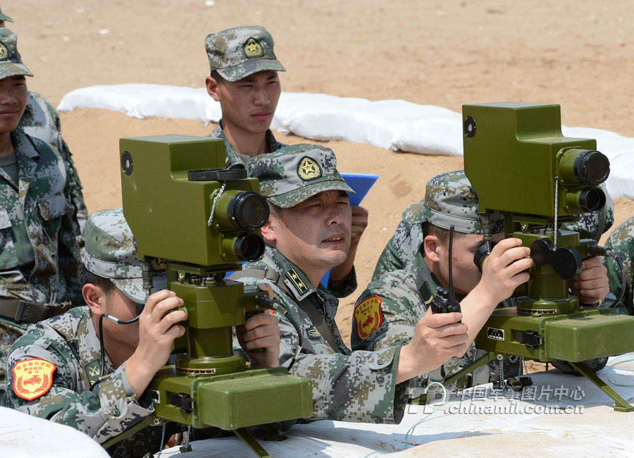 Cadets who will graduate from Langfang Barrack of Nanjing Artillery Academy of the Chinese People's Liberation Army (PLA) in a comprehensive live-ammunition tactical exercises in harsh conditions and complex environment. (China Military Online/Liu Fengan) 