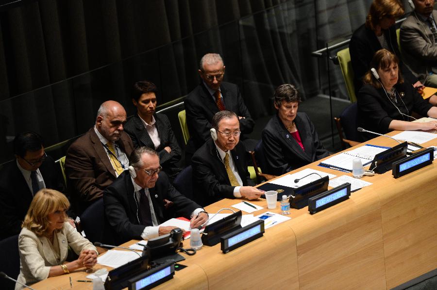 UN Secretary-General Ban Ki-moon (C) attends a special event to mark the opening for signature of the Arms Trade Treaty, at the UN headquarters in New York, on June 3, 2013. The Arms Trade Treaty (ATT), the first international treaty regulating the global conventional weapons commerce, opened for signature at United Nations headquarters on Monday. (Xinhua/Niu Xiaolei) 