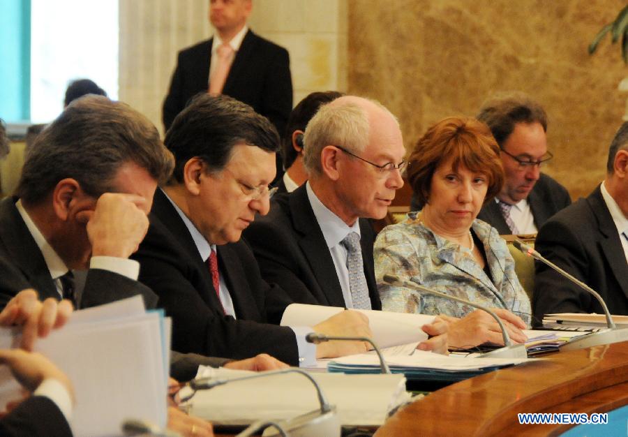 European Council President Van Rompuy (3rd L, Front), European Commission President Jose Manuel Barroso (2nd L, Front) and European Union High Representative for Foreign Affairs and Security Policy Catherine Ashton (4rd L, Front) attend the plenary session of a Russia-EU summit in Yekaterinburg, Russia, on June 4, 2013. Russia and the European Union (EU) should enhance mutual trust and forge a more transparent strategic partnership, President Vladimir Putin said Tuesday during the Russia-EU summit. (Xinhua/Liu Kai) 