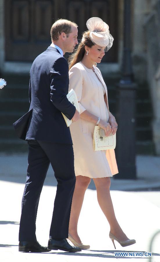 Britain's Prince William (L) and his wife Catherine leave Westminster Abbey after a ceremony celebrating the 60th anniversary of the Coronation of the Queen in London, capital of Britain, on June 4, 2013. (Xinhua/Yin Gang) 